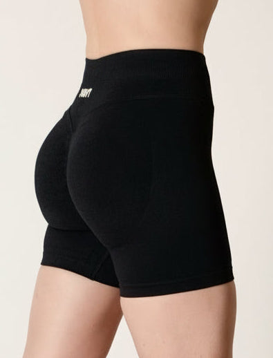 Black seamless high-waisted scrunch gym shorts with a V-shaped back waistband.
