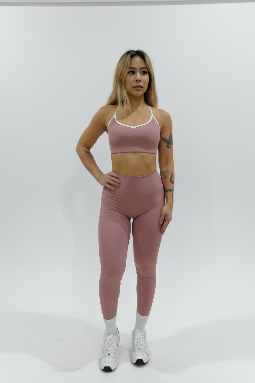 SQWT ContourHeart dusty pink high-waist leggings for women. White contour lines enhance glutes. Squat-proof fitness wear.