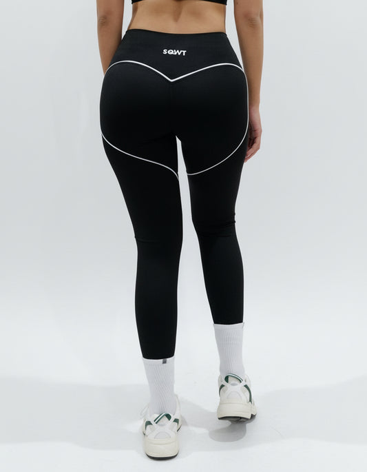 SQWT ContourHeart black high-waist leggings for women. White contour lines enhance glutes. Squat-proof fitness wear.